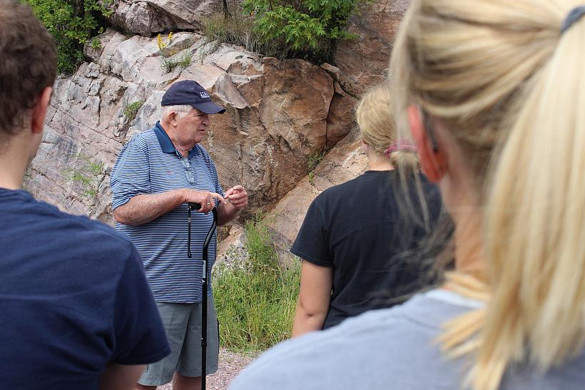 Skip Davis'59 leads a first-of-its-kind geology field trip at Baraboo Hills, WI.